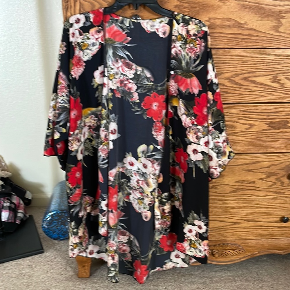 This Kimono is a high low fit with 3/4 length sleeves